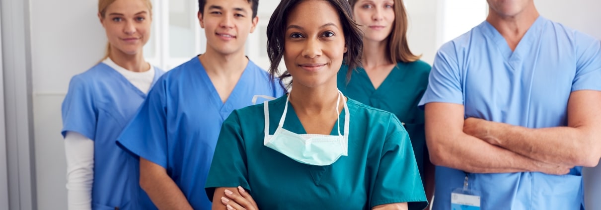 Group of medical professionals in a hallway